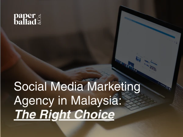 “Social Media Marketing Agency in Malaysia: The Right Choice” brand awareness image showing a person working on a laptop in a dim, focused setting. The screen displays a website interface while hands type on the keyboard, representing strategic digital work, content planning, and choosing the right social media marketing partner to build visibility and growth.