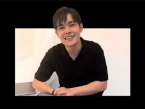 An image of Paperballad's CEO, Casimir Yong smiling gleefully.
